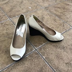 Michael Kors peep toe wedge pump.